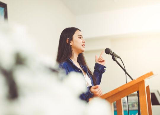 Young woman giving a speech
